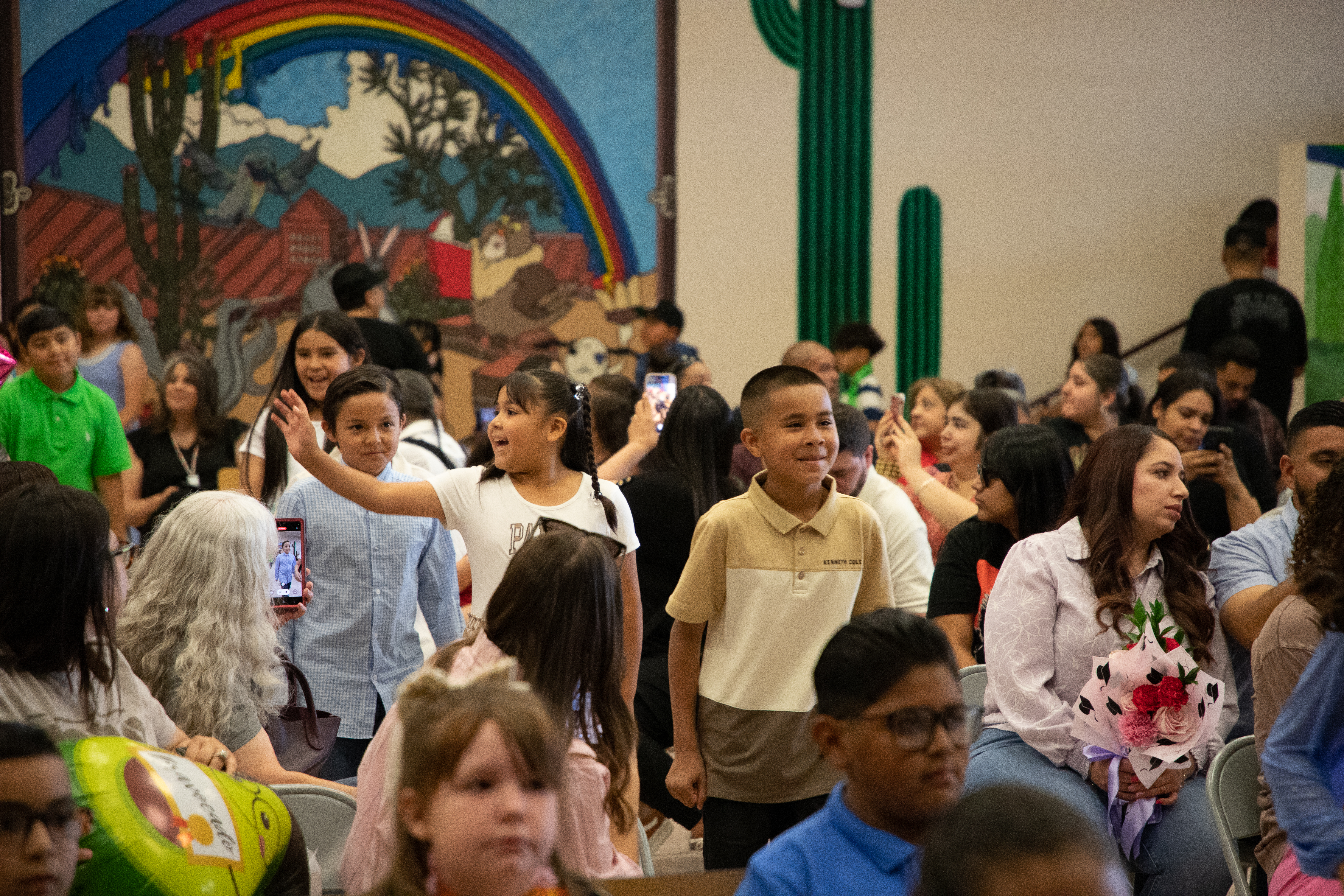 Students walk into the ceremony
